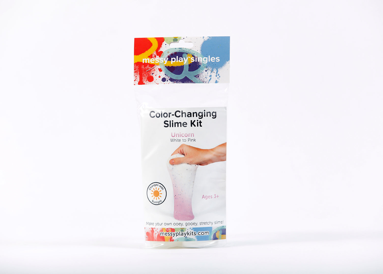 Single packaging for Messy Play Kit's color-changing Unicorn slime that changes from white to pink in the sunlight
