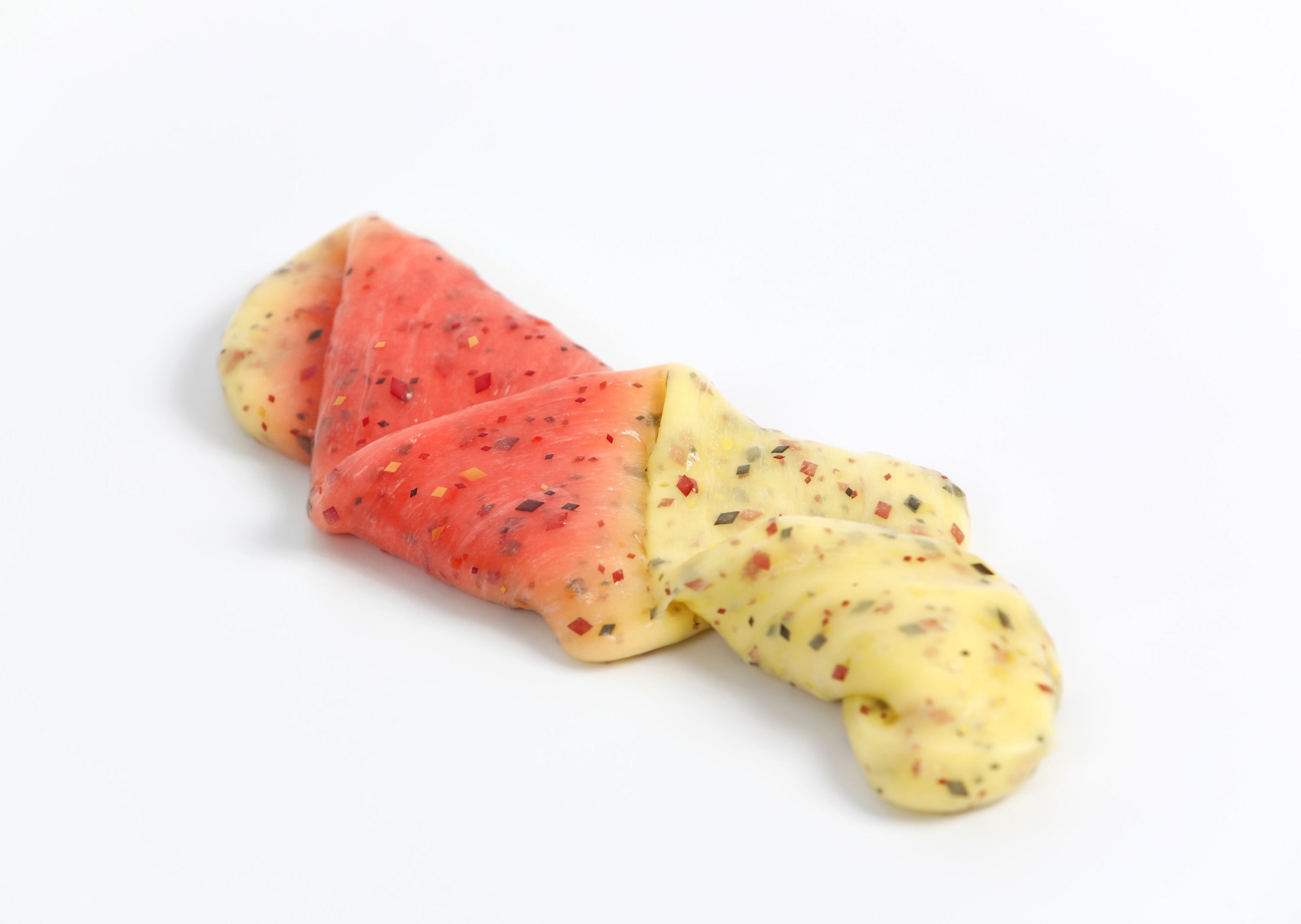 Folded and stretched out Phoenix slime that changes from yellow to red in the sunlight