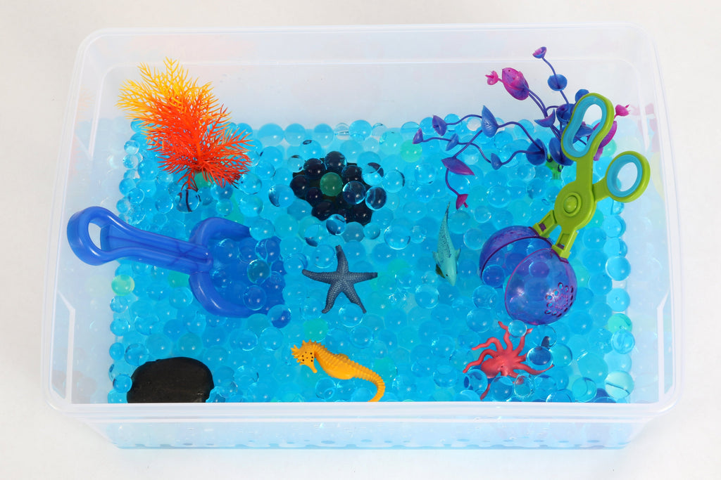 A Sensory Paint Bin for Babies…Keeping the Mess Contained, One