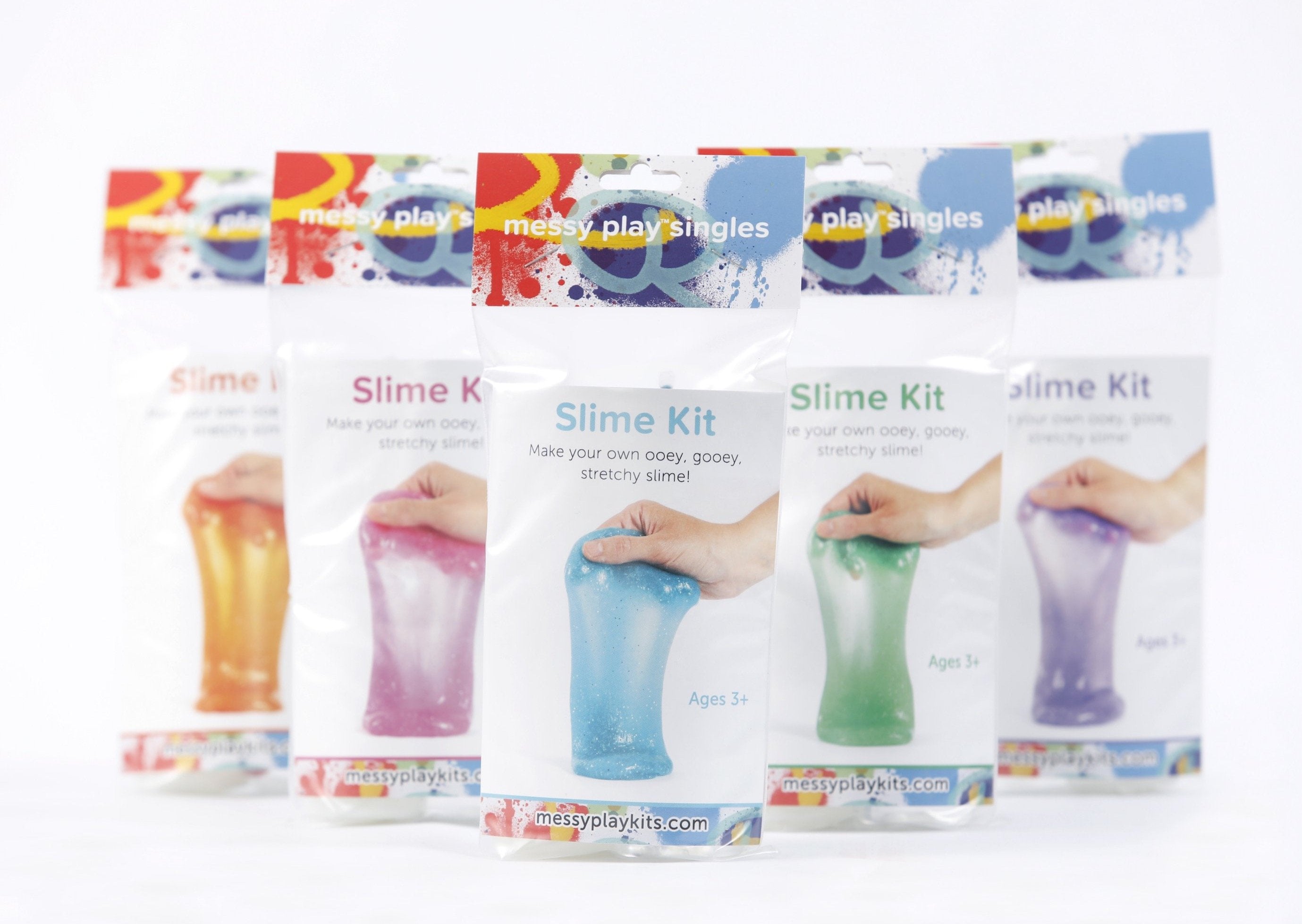 Five packages of glitter slime available in varying colors, including orange, magenta, turquoise, green, and purple.