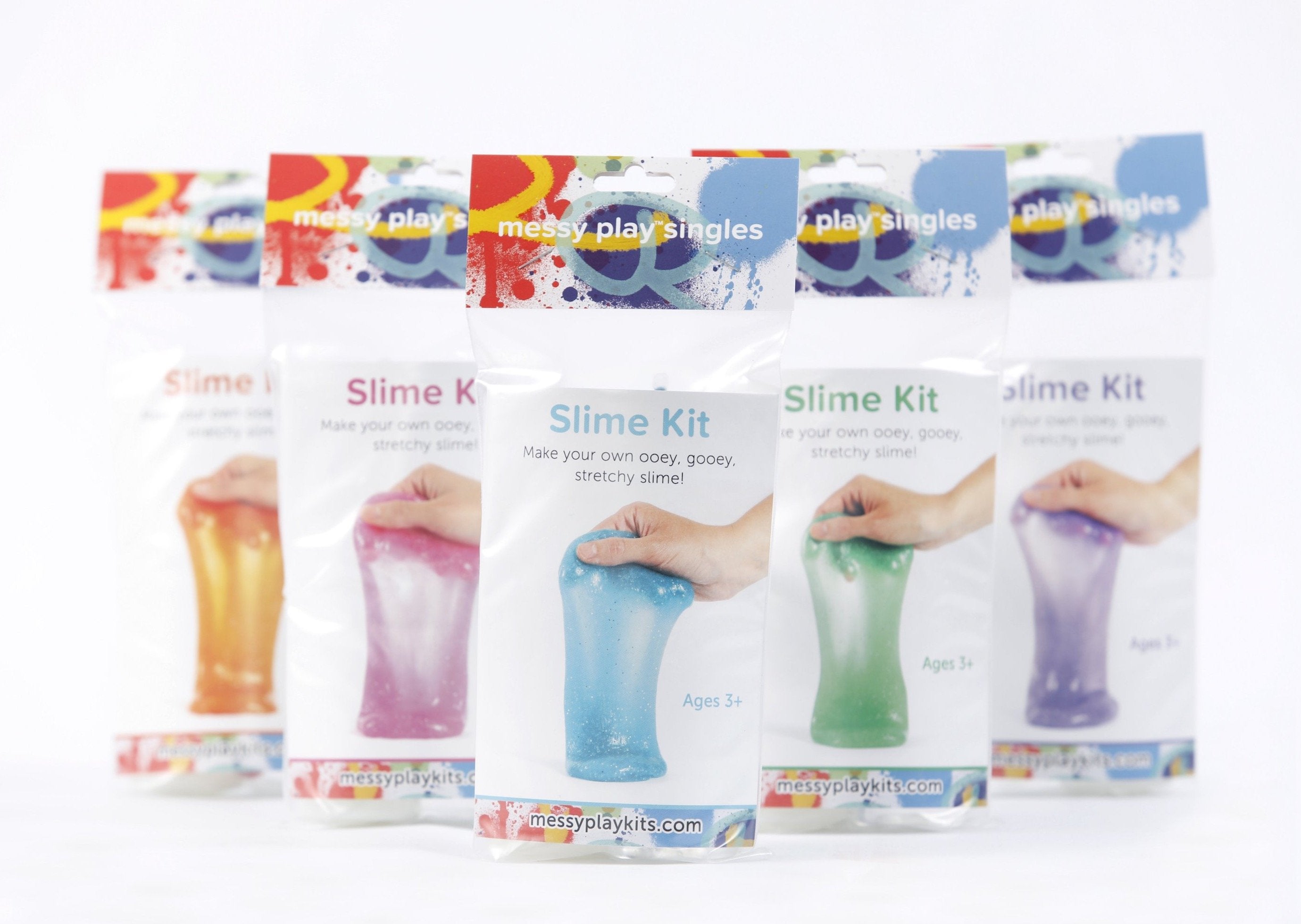 Five packages of glitter slime available in varying colors, including orange, magenta, turquoise, green, and purple.