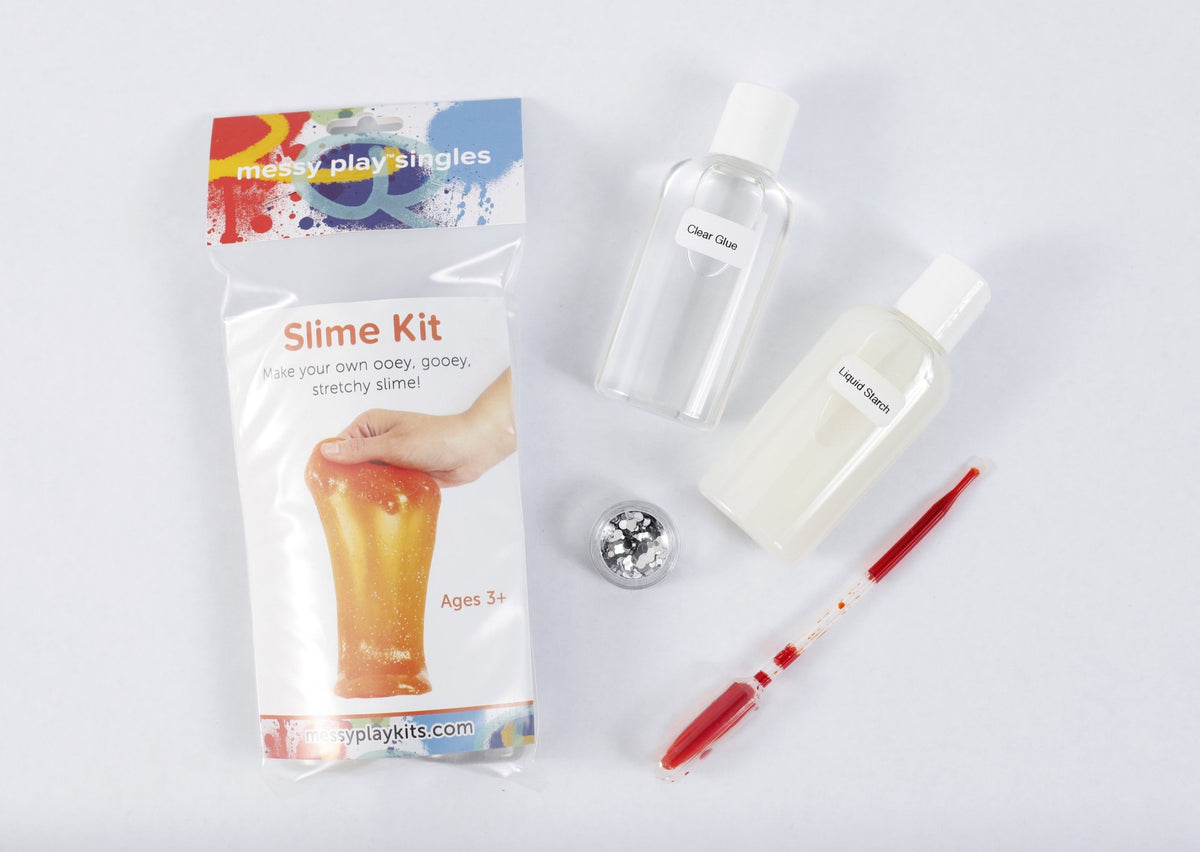 Packaging and contents of a orange glitter slime kit, including a glue bottle, liquid starch bottle, glitter, and a pipette of color.