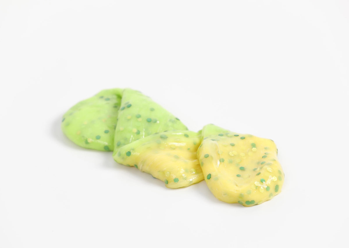 Stretched and folded Dragon slime that changes from yellow to green in the sunlight